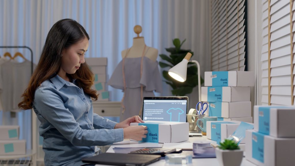 girl stocking her eCommerce marketplace platform