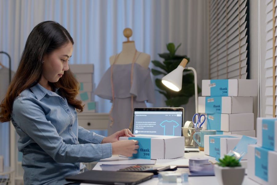 girl stocking her eCommerce marketplace platform
